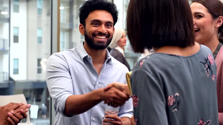 Mumbai business professionals networking and discussing CRM solutions